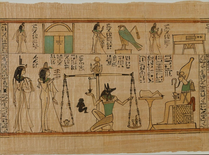 胡狼头神──阿努比斯（Anubis）是埃及神话中掌管木乃伊制作与死后世界的神祇。 在这幅画作里，阿努比斯正在调整一个天平──一个记载于《死者之书》（Book o