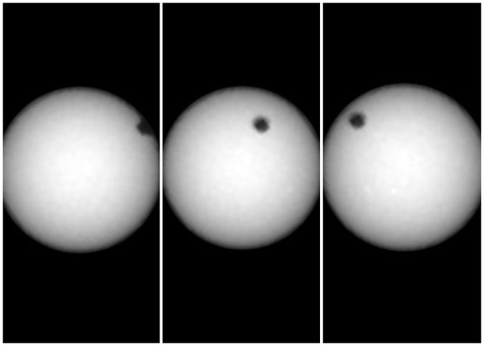 体积细小的火卫二如一个黑点从太阳表面经过。
