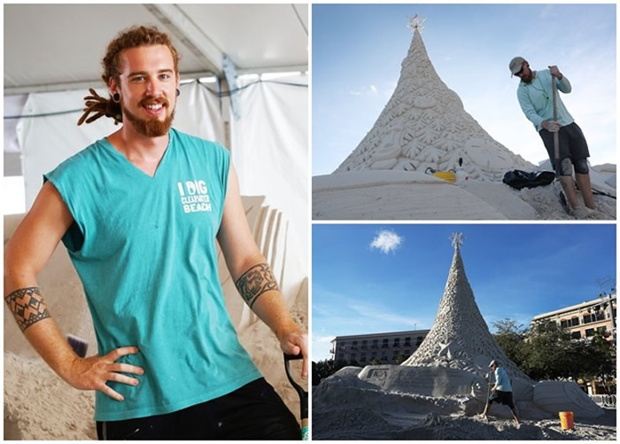 美国沙雕艺术家Dean Arscott在佛罗里达州西棕榈滩用700吨泥沙制作出11米高圣诞树沙雕