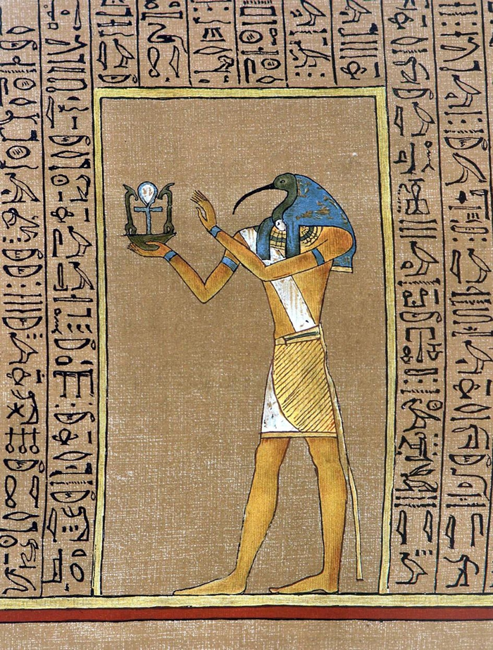 埃及神祇托特（Thoth）传统上的形象有着圣鹮头，手持着象征健康与力量的生命之符（Ankh）。 本图源自埃及《亡者之书》（Book of the Dead）其中
