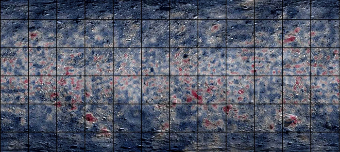 在这幅利用红外光谱技术所绘制出的贝努小行星全球地图上，特别醒目的区域表示富含碳元素，像是有机分子和碳酸盐矿物（红色）。一些巨石上的纹理显示在太阳系形成初期，贝努